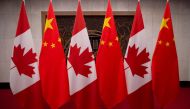 FILE PHOTO: Picture of Canadian and Chinese flags taken prior to the meeting with Canada's Prime Minister Justin Trudeau and China's President Xi Jinping at the Diaoyutai State Guesthouse on December 5, 2017, in Beijing. Fred Dufour/Pool via REUTERS/File 