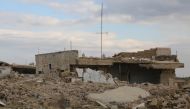 A destroyed building is seen in ruins of a settlement after land and air strikes, which were continued for 8 years, in Hama, designated in the Idlib de-escalation zone, Syria on December 28, 2018. ( E?ref Musa - Anadolu