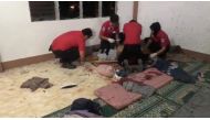  Rescue personnel work to resuscitate a victim after a grenade attack on a mosque in Zamboanga, Philippines, January 30, 2019, in this still image taken from a video from social media. Zamboanga Quick Response System/via Reuters 