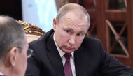 Russian President Vladimir Putin looks on during a meeting with Defence Minister Sergei Shoigu and Foreign Minister Sergei Lavrov at the Kremlin in Moscow, Russia, February 2, 2019. 