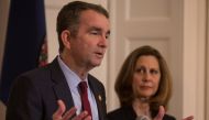 Virginia Governor Ralph Northam, accompanied by his wife Pamela Northam announces he will not resign during a news conference Richmond, Virginia, U.S. February 2, 2019. REUTERS/ Jay Paul