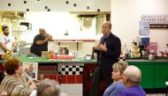 Former US Representative and 2020 Democratic presidential candidate John Delaney speaks with patrons during a campaign stop at TC Mae's restaurant on January 31, 2019 in Fort Dodge, Iowa. AFP / Joshua Lott