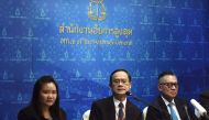 Chatchom Akapin, (C), director general for international affairs of the Office of the Attorney General, speaks during a press conference regarding the case of Bahraini refugee footballer Hakeem al-Araibi in Bangkok on February 6, 2019. Thailand will not g