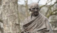 FILE PHOTO: A statue of Indian independence icon Mahatma Gandhi is pictured at Parliament Square in central London.   AFP / NIKLAS HALLE'N