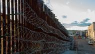 New strands of concertina welded by US Army engineers to the fence that separates the US and Mexico are shown in downtown Nogales, Arizona, February 4, 2019. Reuters/Paul Ingram