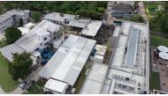 Aerial view of the Brazilian Flamengo football club training center after a building that housed players aged 14 to 17 caught fire at dawn in Vargem Grande neighborhood, west of Rio de Janeiro, Brazil, on February 8, 2019. AFP / Marie HOSPITAL