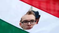 A demonstrator protests after Hungarian Prime Minister Viktor Orban delivered his annual state of the nation address in Budapest, Hungary, February 10, 2019. Reuters/Bernadett Szabo