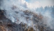 Smoke rises from the Richmond fire near Nelson, South Island, New Zealand, February 8, 2019. Chad Sharman/New Zealand Defence Force/Handout via REUTERS 