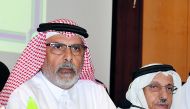 The Chairman and Managing Director of Qatar National Cement Company, Salem bin Bhutti Al Naimi (left), addressing the company’s AGM at Radisson Blu Hotel in Doha, yesterday.  Pic: Salim Matramkot/The Peninsula
