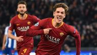 AS Roma Italian midfielder Nicolo Zaniolo celebrates after opening the scoring during the UEFA Champions League round of 16, first leg football match AS Roma vs FC Porto on February 12, 2019 at the Olympic stadium in Rome. / AFP / Andreas SOLARO
