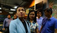 Philippine journalist Maria Ressa (front L) leaves her office after she was arrested in Manila on February 13, 2019. (AFP / MARIA TAN)