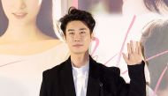 This picture taken on February 8, 2018 shows South Korean rapper San E during a press conference for his movie 