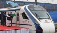 In this photo taken on February 15, 2019, Indian Prime Minister Narendra Modi (2nd L) flags off India's first semi-high speed express train Vande Bharat Express at New Delhi Railway Station. AFP / STR