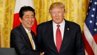 FILE PHOTO of Japanese Prime Minister Shinzo Abe (L) and US President Donald Trump. Reuters