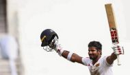 Sri Lanka's Kusal Perera celebrates the victory after hittting the winning runs of a South Africa's player during the fourth day of the first Cricket Test between South Africa and Sri Lanka at the Kingsmead Stadium in Durban on February 16, 2019. / AFP / 