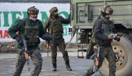 Indian Army soldiers arrive near the site of a gun battle between suspected militants and Indian security forces in Pinglan village in south Kashmir's Pulwama district February 18, 2019. REUTERS/Younis Khaliq 