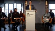 Former Labour party MPs Chris Leslie (L), Mike Gapes (2L), Luciana Berger (3L), Ann Coffey (4L), Angela Smith (2R) and Chuka Umunna (R) listen as Gavin Shuker speaks during a press conference in London on February 18, 2019, where he and colleagues announc