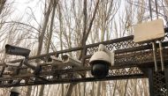 FILE PHOTO - Security cameras are installed at the entrance to the Id Kah Mosque during a government organised trip in Kashgar, Xinjiang Uighur Autonomous Region, China, January 4, 2019. Picture taken January 4, 2019. REUTERS/Ben Blanchard