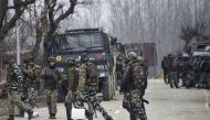 Indian security forces personnel are on manoeuvres as a gunfight with militants has happened that killed 4 soldiers, in South Kashmir's Pulwama district, some 10 km away from the spot of recent suicide bombing, on February 18, 2019. AFP / STR