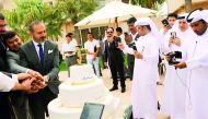 Officials of Simaisma Resort cutting a cake to celebrate the third anniversary of the resort. 