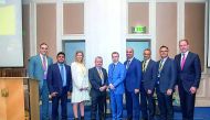 EY tax experts on the sidelines of the conference in Doha.