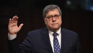 (FILES) In this file photo taken on January 15, 2019 William Barr, nominee to be US Attorney General, takes the oath before testifying during a Senate Judiciary Committee confirmation hearing on Capitol Hill in Washington, DC. AFP / SAUL LOEB