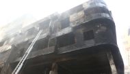 A general view of a burnt warehouse in Dhaka, Bangladesh, February 21, 2019. REUTERS/Mohammad Ponir Hossain