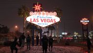 Visitors take photos at the Welcome to Fabulous Las Vegas sign as it snows during a winter storm on February 20, 2019 in Las Vegas, Nevada. Ethan Miller/Getty Images/AFP