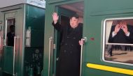 This picture taken on February 23, 2019, and released from North Korea's official Korean Central News Agency on February 24 shows Kim Jong Un (C) departing Pyongyang Station for the second North Korea-US summit meeting in Hanoi AFP /KCNA via KNS