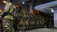 Bangladeshi security personnel stand guard at the Shah Amanat International Airport in Chittagong on February 24, 2019, after an emergency landing of the hijacked Dubai-bound Bangladesh Biman plane.  AFP 