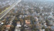 FILE PHOTO: Thousands of houses in New Orleans Louisiana are seen under water one week after Hurricane Katrina went through Louisiana Mississippi, and Alabama in this September 5, 2005 photo.  Reuters/Allen Fredrickson