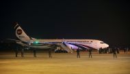 Security personnel stand guard outside of the hijacked aircraft of the Biman Bangladesh Airlines in the Shah Amanat International Airport in Chattogram, Bangladesh February 24, 2019. REUTERS/Stringer