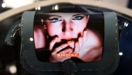 A purse featuring Royole's foldable mobile device FlexiPai is displayed at the Mobile World Congress (MWC) in Barcelona on February 25, 2019.  AFP / Lluis Gene 