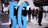 A 5G sign is displayed at a stand at the Mobile World Congress (MWC) in Barcelona on February 25, 2019. AFP / Josep Lago 