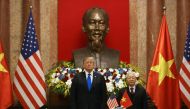 US President Donald Trump and Vietnamese President Nguyen Phu Trong stand before a signing ceremony at the Presidential Palace in Hanoi, Vietnam, February 27, 2019. REUTERS/Leah Millis