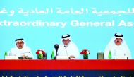 Turki bin Mohammed Al Khater (centre), Chairman of UDC; with Ali Hussain Al Fardan (right), Board member; and Nasser Jaralla Almarri, Board member, during the Ordinary and Extraordinary General Assembly meeting 2018 in Doha, yesterday. Pic: Abdul Basit / 