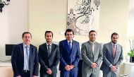 Dr. Abdulbasit Ahmad Al Shaibei (centre), QIIB Chief Executive Officer, with other officials on the sidelines of the Sukuk issuance announcement.
