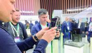 Visitors take photos of recently unveiled Huawei Mate X at Huawei’s main pavilion at the Mobile World Congress 2019 which concludes today. PIC: Raynald C Rivera/The Peninsula