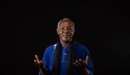 Burkina Faso film director Abdoulaye Dao poses for a portrait in Ouagadougou, on February 25, 2019 during the 