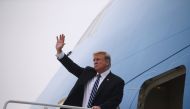 US President Donald Trump boards Air Force One after his summit with North Korean leader Kim Jong Un, at Noi Bai International Airport in Hanoi, Vietnam, February 28, 2019. REUTERS/Leah Millis