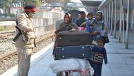 Stranded Pakistani passengers leave Attari Railway station following the temporary suspension by the Pakistani authorities of the Samjhauta Express rail service on February 28, 2019.  AFP / Narinder Nanu 