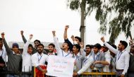 People shout slogans before the arrival of Indian Air Force pilot, who was captured by Pakistan on Wednesday, near Wagah border, on the outskirts of the northern city of Amritsar, India, March 1, 2019. REUTERS/Danish Siddiqui