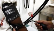 A doctor checks the blood pressure of a patient at the J.W.C.H. safety-net clinic in the center of skid row in downtown Los Angeles July 30, 2007. Reuters/Lucy Nicholson