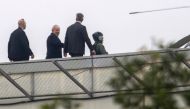 Brazilian former president Luiz Inacio Lula da Silva (2nd L) leaves the Federal Police headquarters in Curitiba, Parana state, where he is serving a 12-year prison sentence, to attend the funeral of his grandson on March 2, 2019.AFP / FRANKLIN DE FREITAS