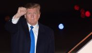 US President Donald Trump disembarks from Air Force One upon arrival at Joint Base Andrews in Maryland, February 28, 2019, following a trip to Hanoi, Vietnam, for his second summit with North Korean Leader Kim Jong Un. / AFP / SAUL LOEB 