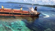 This undated handout provided by the Department of Foreign Affairs and Trade (DFAT) of Australia on March 1, 2019 shows the oil spill from the MV Solomon Trader along the coastline of Rennell Island, some 240 kilometres south of the capital Honiara. AFP P