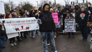 Demonstrators burned Thin Blue Line flags outside Sacramento Police Department on March 2, 2019, in Sacramento, California. Sacramento County District Attorney Anne Marie Schubert announced Saturday that officers did not break any laws when they shot Step