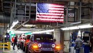 Jeep Wranglers move to the Final 1 assembly line at the Chrysler Jeep Assembly plant in Toledo, Ohio, US, November 16, 2018. Reuters/Rebecca Cook