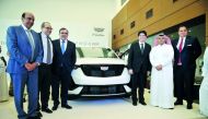 Khalid Ahmed Al Mannai (second right), Vice-Chairman, Mannai Corporation; with Alekh Grewal (left), Group Chief Executive Officer & Director; and other officials during the display of Cadillac XT6 at Cadillac’s new showroom in Industrial Area, yesterday. 