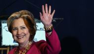(FILES) In this file photo taken on February 16, 2017 former US Secretary of State and Democratic presidential nominee Hillary Clinton waves as she arrives to unveil US postal service issued Oscar de la Renta Forever stamp during a ceremony in New York. A